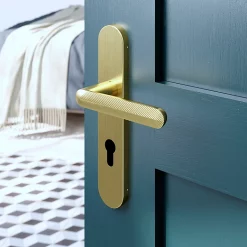 Castorama Ensemble Poignée Sur Plaque Rondcylindre GoodHome Garlan Effet Laiton Satin Doré L.125mm X L.42mm Entraxe 165-195mm